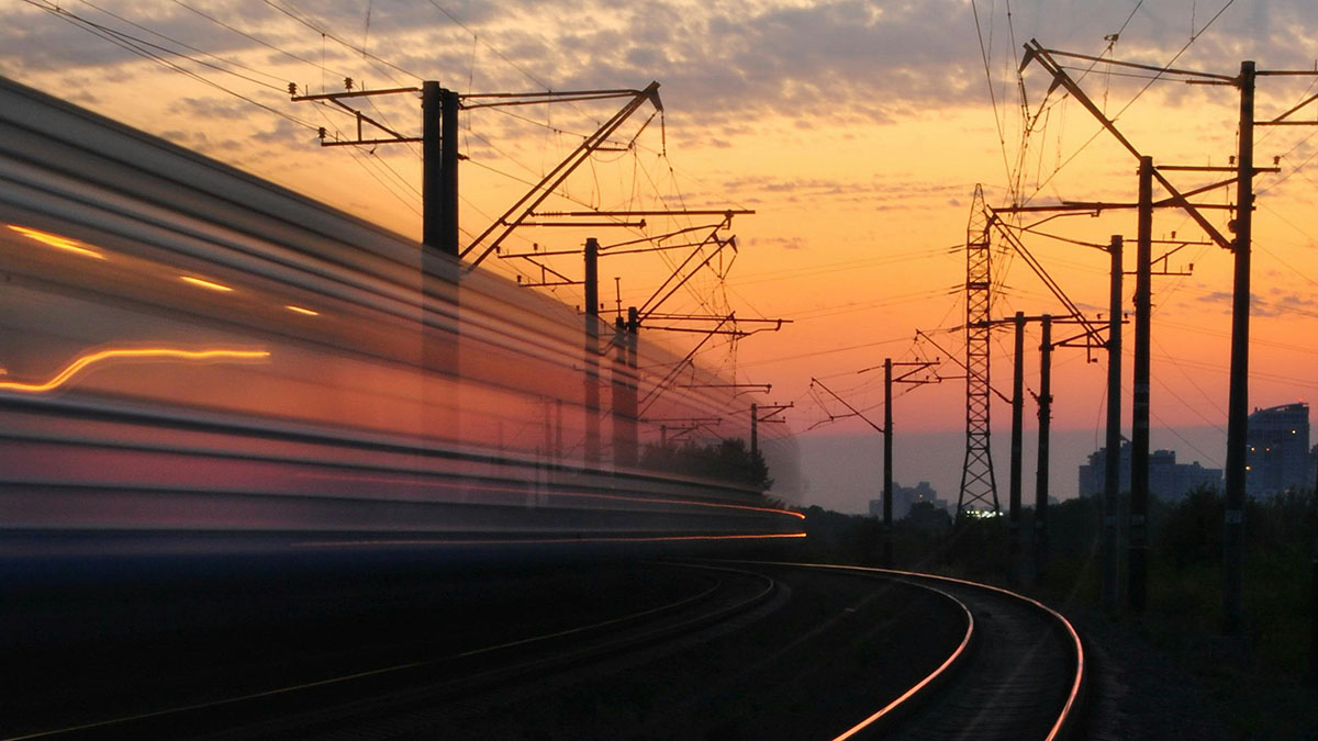 Railway electrification long exposure with train passing